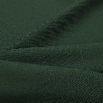 Ткань костюмная 21010 2076, 225 гр/м2, шир.150см, цвет т.зеленый - купить в Кемерово. Цена 390.73 руб.